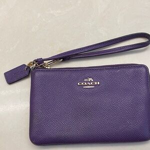 Coach Purple Leather Wristlet with Gold-Tone Logo. Certificate of authenticity